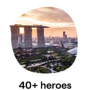 Marina Bay Sands and Gardens by the Bay at sunset, showcasing the iconic skyline and lush greenery of Singapore
